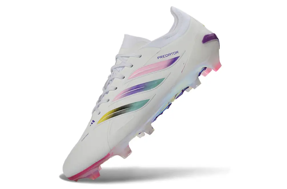 Close-up of Adidas Predator 26 Elite FG soccer cleats, featuring advanced technology for improved traction and ball control.