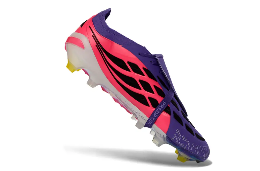 Adidas Predator 26 Elite Tongue FG football boot on a grass field