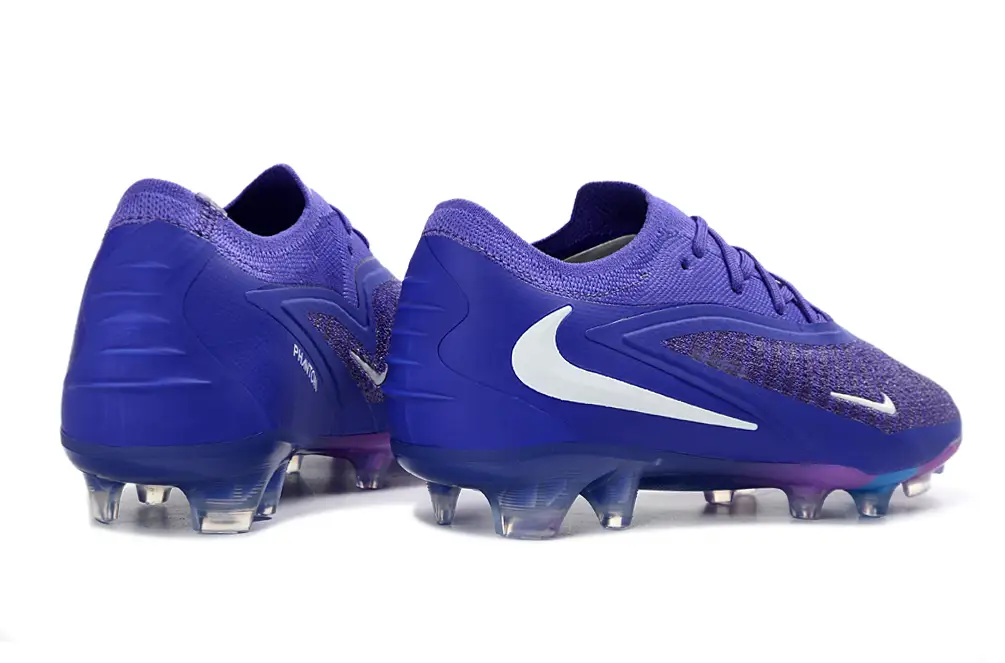 Side profile of Nike Phantom 6 Elite Firm Ground Football Boots for Men by Nike