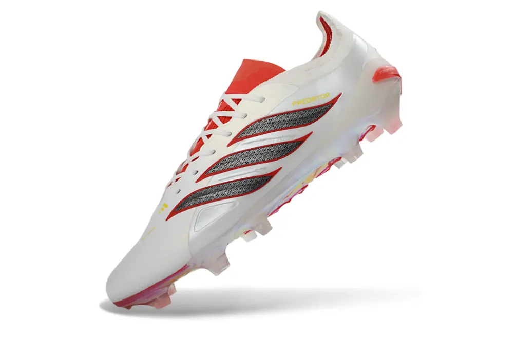 Close-up of Adidas Predator 26 Elite FG soccer cleats with textured studs