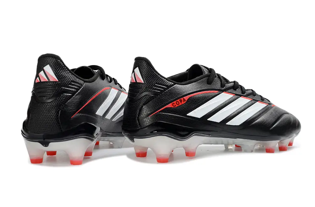 Adidas Copa Pure IV Elite FG football with player's foot on the ball, showcasing comfort and control