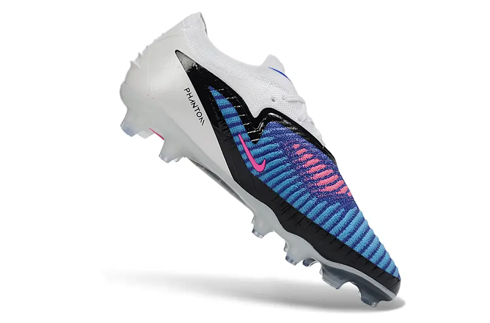 Nike Phantom 6 Elite FG soccer cleat in action, showcasing agility and quick movements