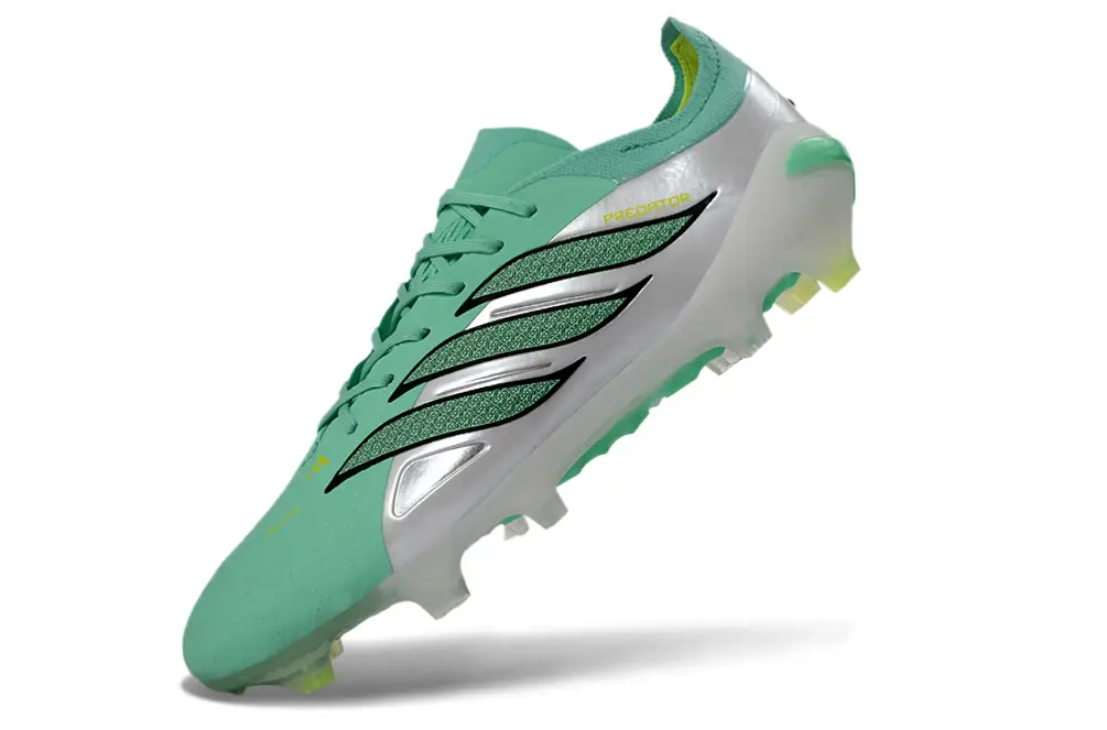 Close-up of Adidas Predator 26 Elite FG football cleat with textured upper and stud pattern.