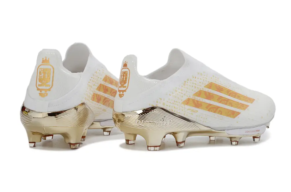 Adidas F50+ Elite FG Laceless Soccer Cleats with player foot