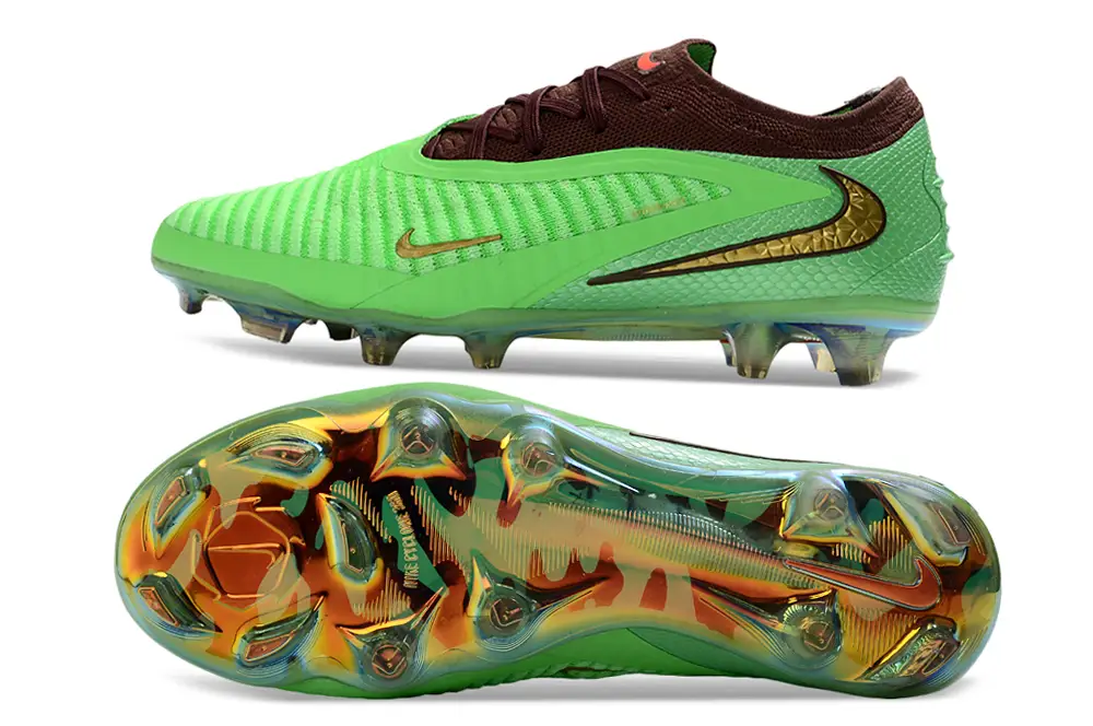 Bottom view of Nike Phantom 6 Elite FG x Travis Scott showing advanced firm ground traction soleplate for speed and control