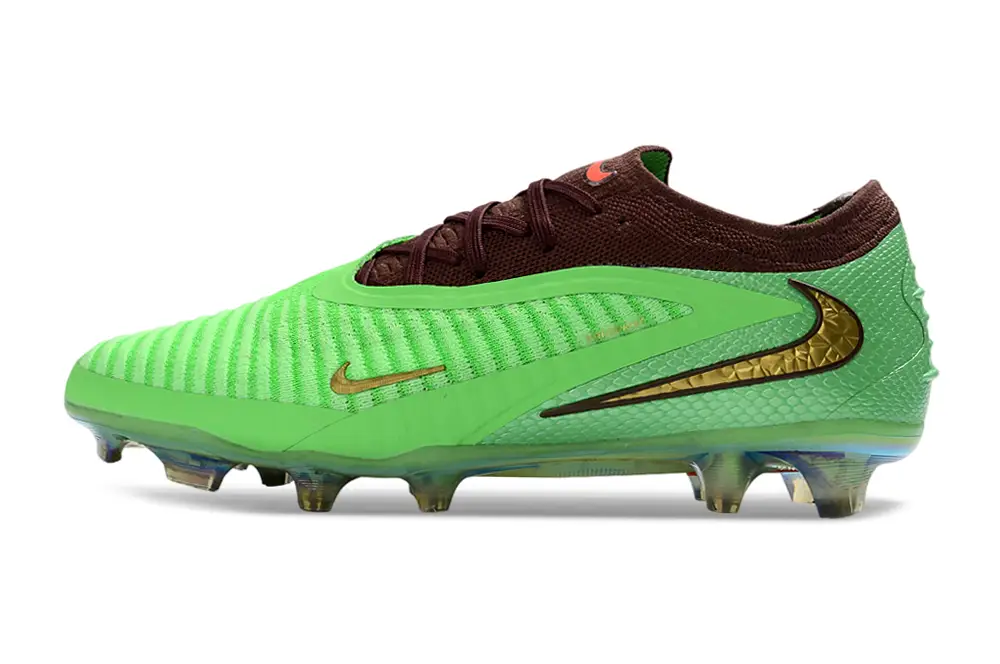 Nike Phantom 6 Elite FG x Travis Scott football boots front view showing Cactus Jack design and premium Gripknit upper