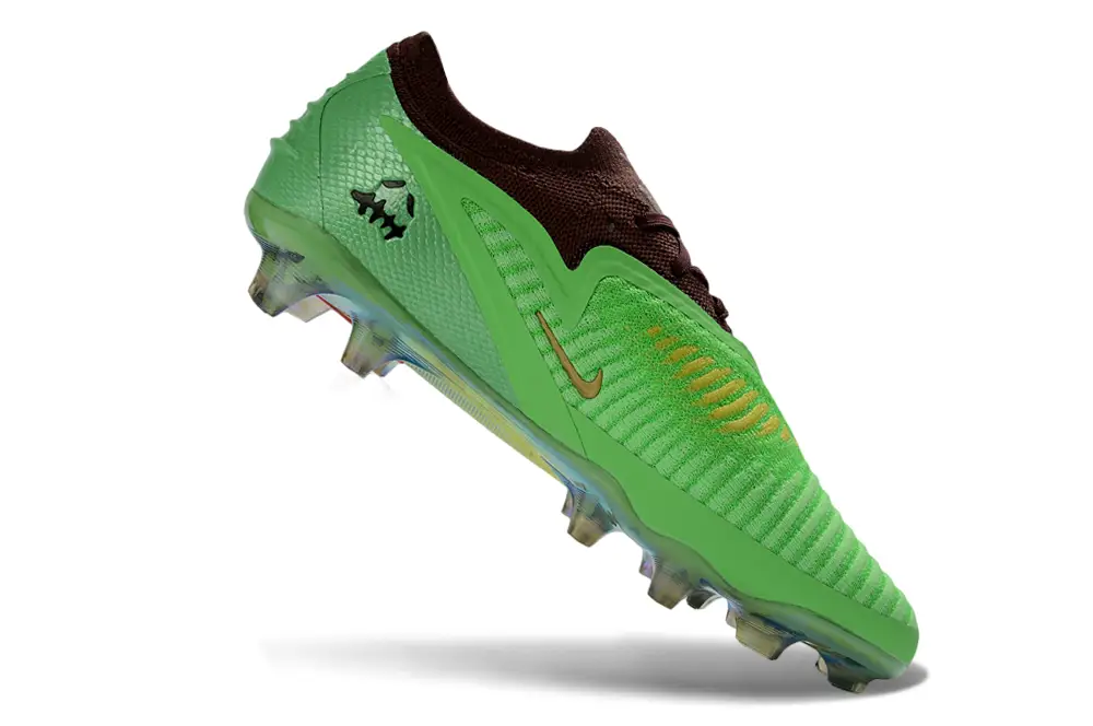 Close-up detail of Nike Phantom 6 Elite FG Travis Scott Cactus Jack football boot highlighting Gripknit texture and stitching